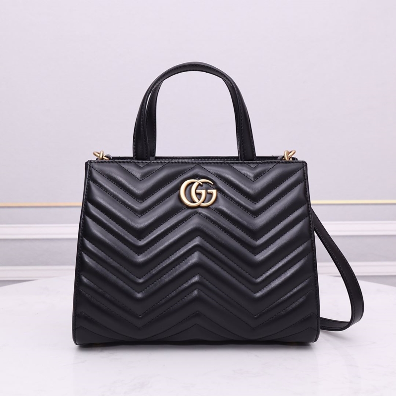 G*u*i shopping bags